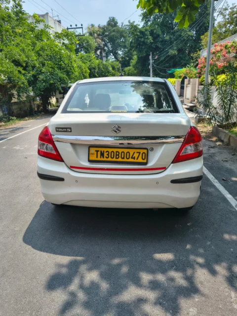 Dzire taxi rear view with taxi number plate