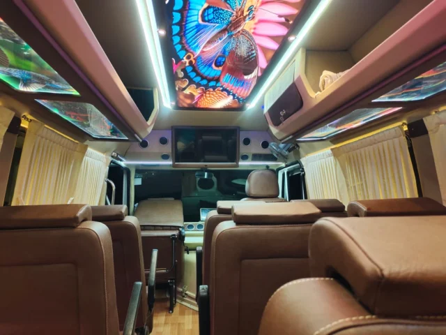 Tempo traveller interior with push-back seats